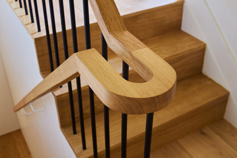 Hand crafted wooden stair banister detail